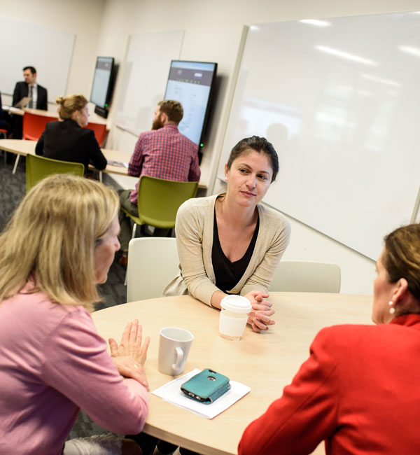 Collaborate - talking at table