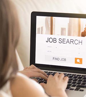 job search on laptop