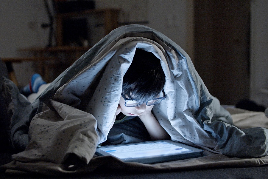 photo of child on tablet