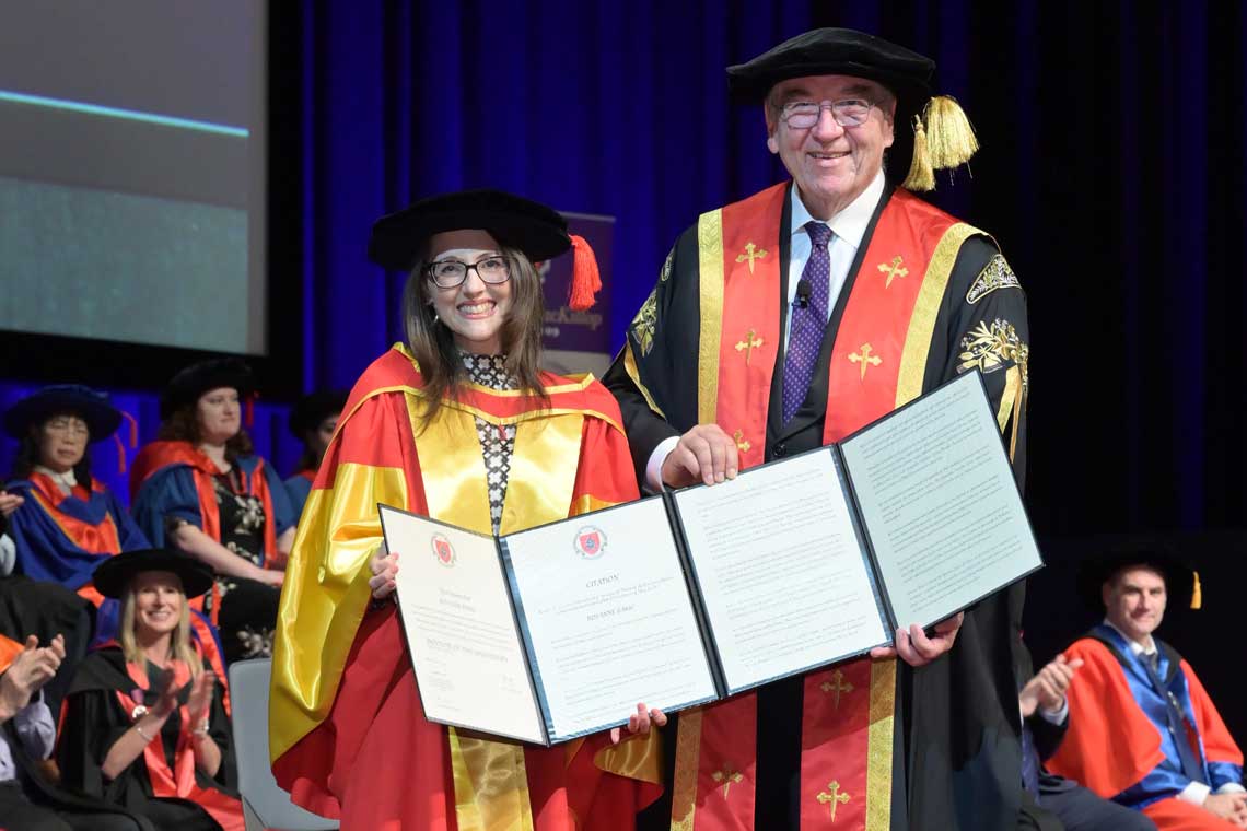  Parent advocate Rose Babic receiving a Doctor of the University from ACU Chancellor The Hon Mart