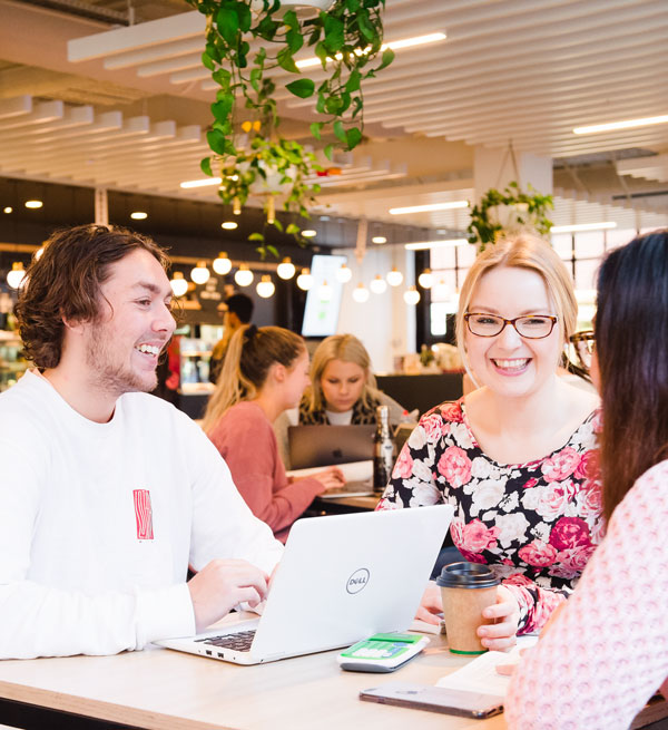 Drinking coffee at a cafe