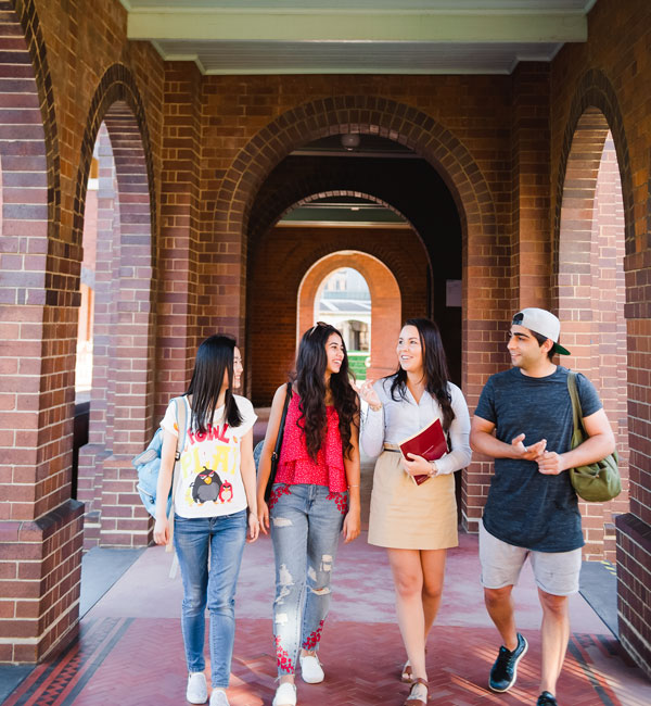 People walking in large hallways