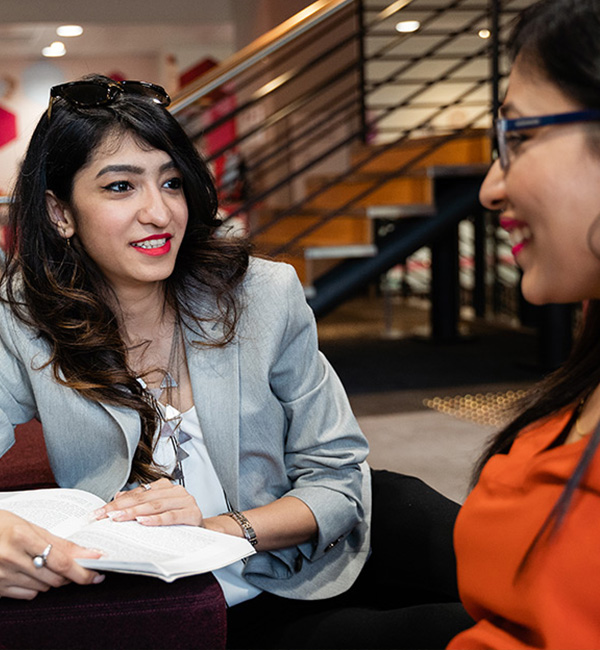 ACU literature students discussing their work