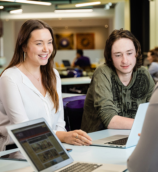 ACU Politics and international relations students working on their laptops