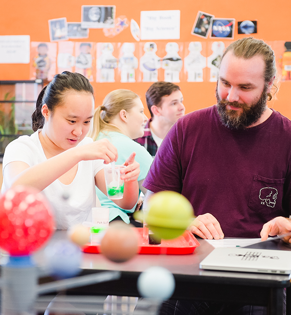 ACU primary education students trying out an experiment
