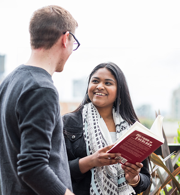 ACU theology students sharing ideas about their work