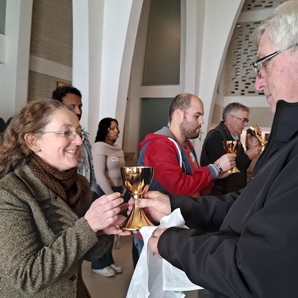 photo of ministering the chalice