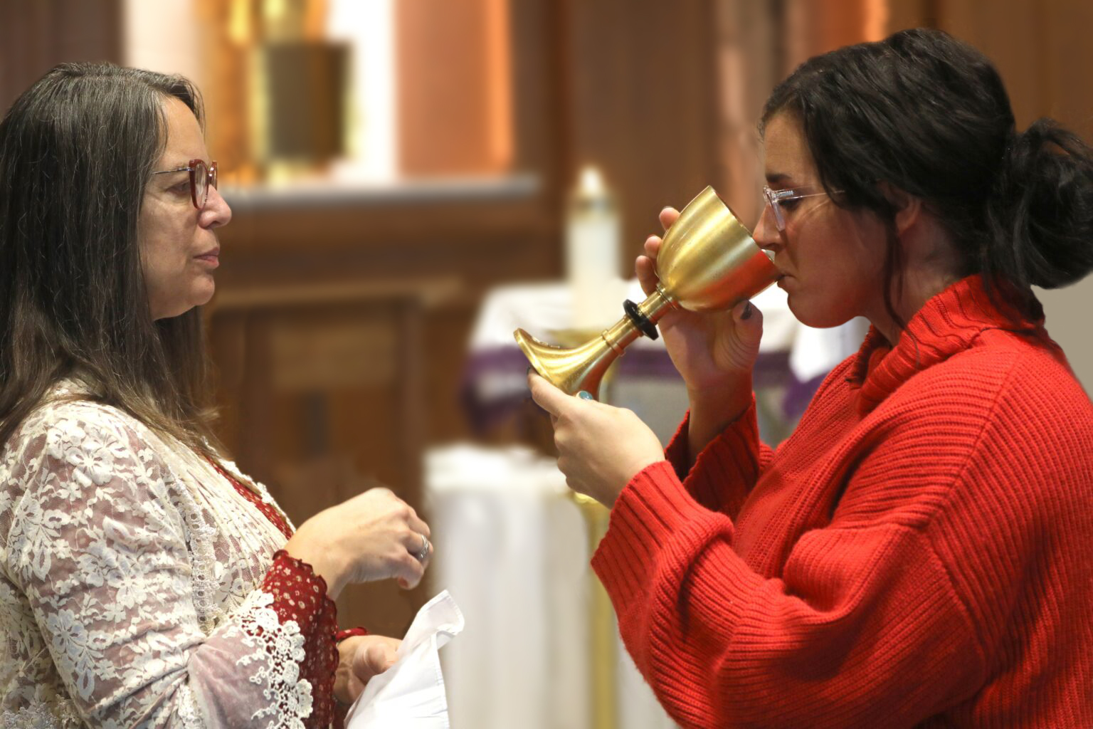 photo of person drinking chalice