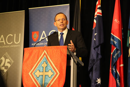 Tony Abbott presenting in 2015.