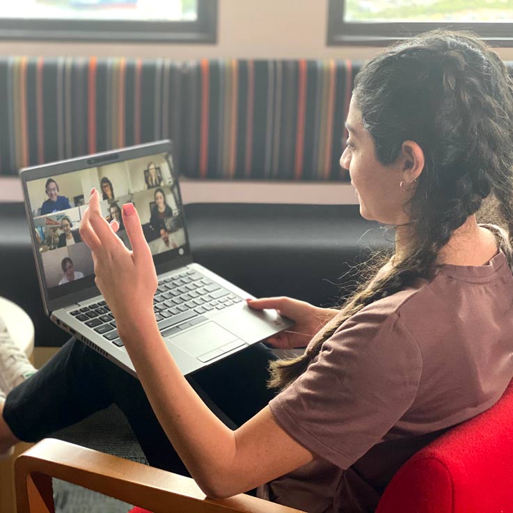 Girl on a video conference call on a laptop.