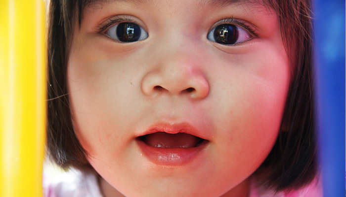  toddler's face with a happy but surprised look