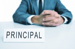 school-principal-at-desk-300x199